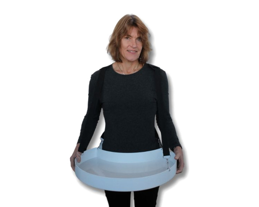 Woman wearing an unbranded white vendor tray on shoulder straps, held at waist height