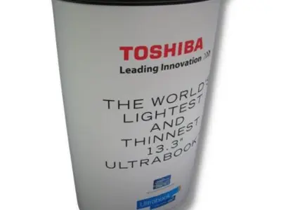 Oval Toshiba Ultrabook plinth with a wrap-around graphic and a recessed screen on top