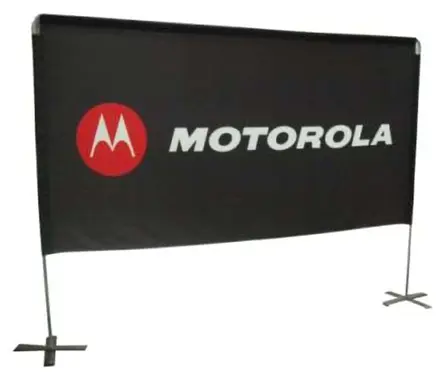 Black Motorola banner with a white and red logo on a frame with cross-shaped feet