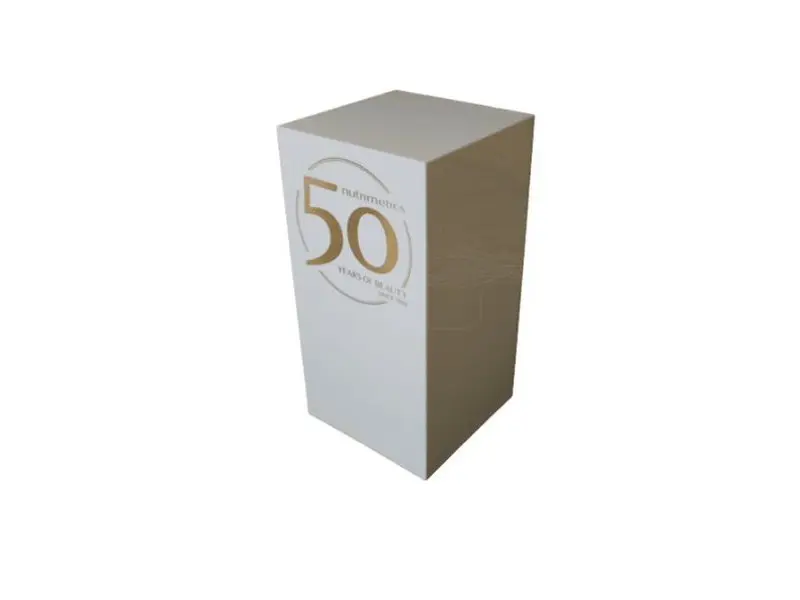 White plinth with gold lettering