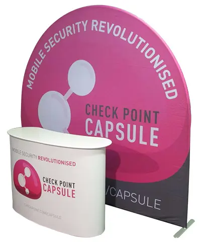 Check Point Capsule curved counter in front of an arched fabric backdrop with security message