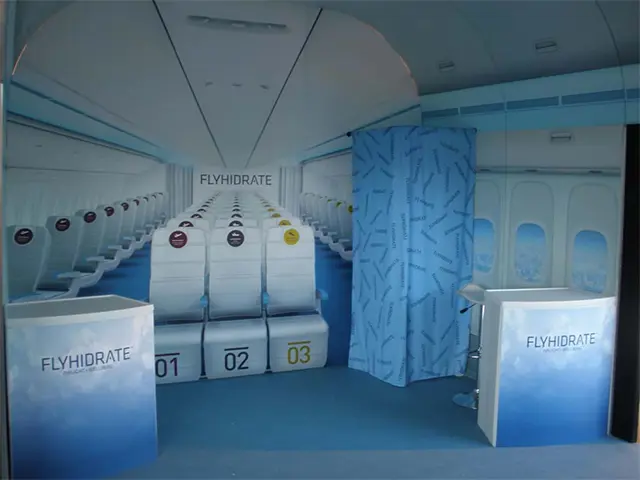 FLYHIDRATE aircraft cabin set with printed walls, numbered seats and two branded counters