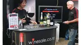 Promotional counter for wine tastings at an expo