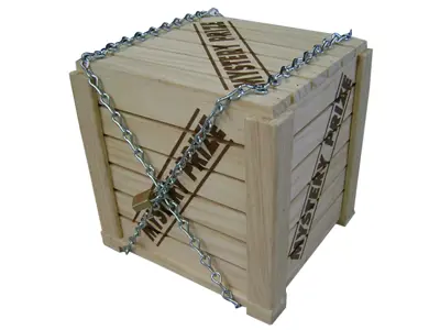 Timber crate stencilled with Mystery Prize on top and sides, wrapped in chains and padlocked