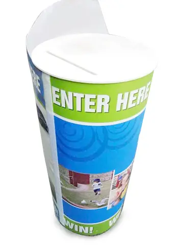 Green and blue cylinder with a bold 'ENTER HERE' band and a lid slot