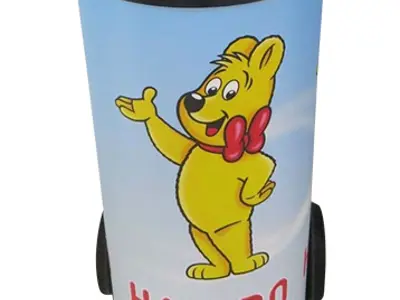 White Haribo cooler trolley on two wheels with a handled lid and gold bear graphic