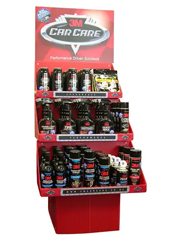 3M Car Care unit with a large header above angled red trays of bottles