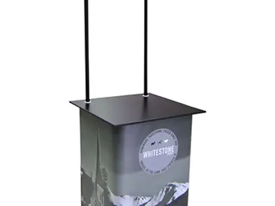 Whitestone Cheese counter on wheels with a twin-pole header and mountain village wrap