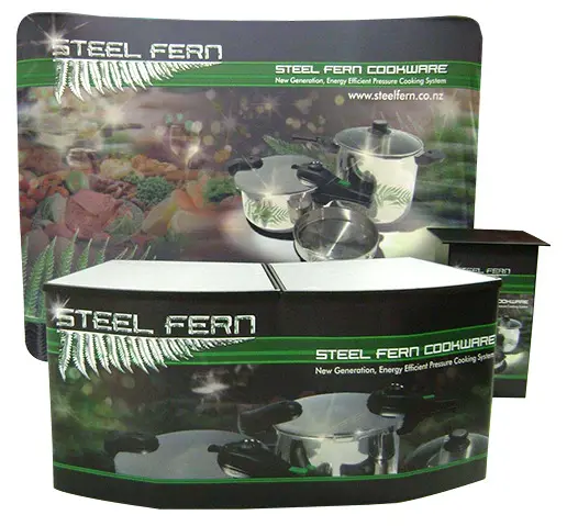 Steel Fern Cookware curved backdrop, counter and podium printed with pressure cooker images