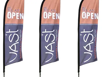 Row of tall VAST Interior feather flags announcing OPEN outside a furniture store