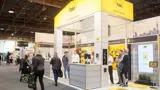 Trade show display with a house roof and try-me zone
