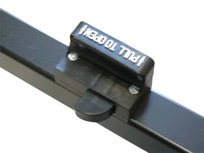 Pull-to-open latch with arrows and white lettering on a Screenflex divider frame rail