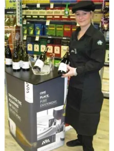 ARA wines demo table with open bottles and an ice bucket in a liquor store
