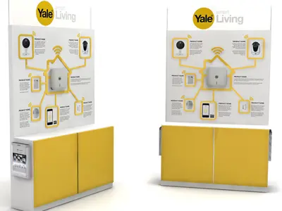 Concept design of a Yale Smart Living stand with a yellow house graphic